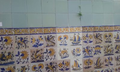 A colorful wall of azulejos in the countryside